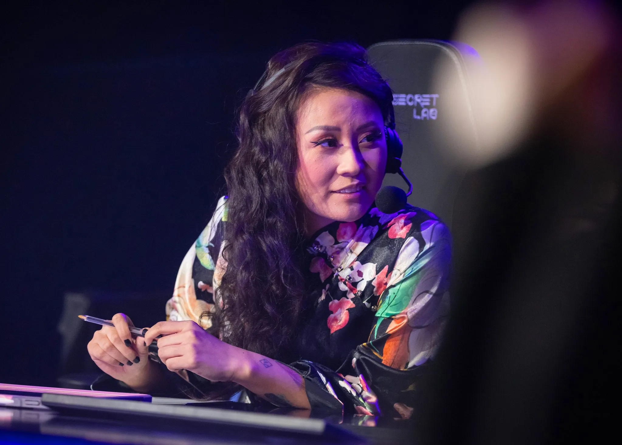 Commentator Yinsu Collins at the VALORANT Champions Tour 2021: Stage 3 Masters Grand Finals on September 19, 2021 in Berlin, Germany wearing the "elevated streetwear" style createdby the VALORANT Champions Tour stylists