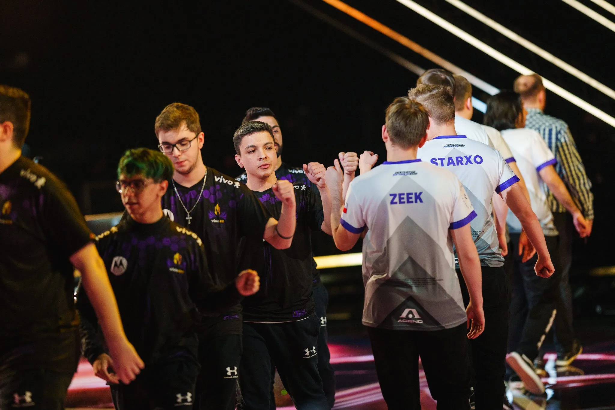 Vivo Keyd shakes hands with Acend after their initial match